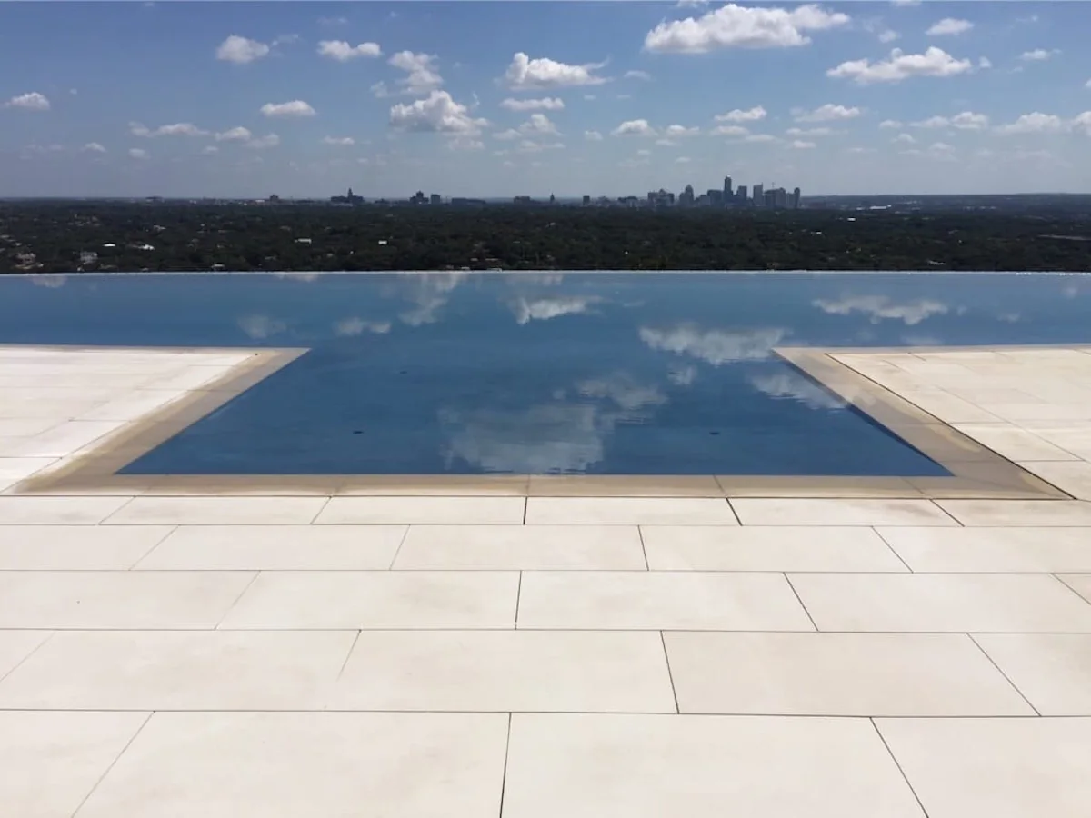 FIG. 13 — INFINITY POOL & SKYLINE VIEW