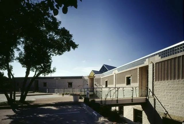 FIG. 02 — COURTYARD APPROACH & BRIDGE