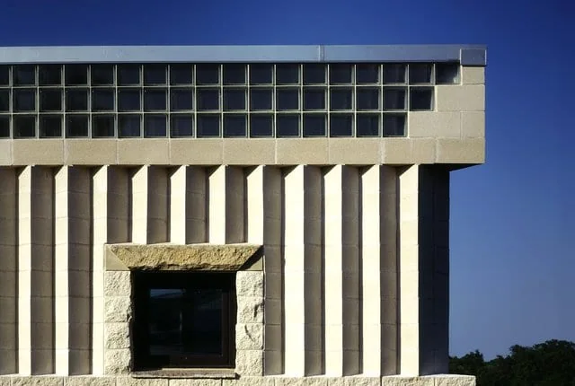 FIG. 03 — SAWTOOTH WEST FACADE & CLERESTORY